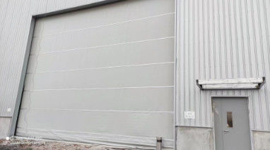 Buy Operating Temperature Range Minus 30 Degrees Celsius To Plus 60 Degrees Celsius Vertical Lift Fabric Doors With Obstacle Detection Emergency Stop And Maximum Height 12 Meters online manufacture