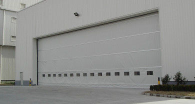 Buy strength Industrial Fabric Vertical Lift Fabric Doors Featuring Maximumheight 12 Meters and Windresistance Up To 120 Kmh Ideal for Warehouses online manufacture