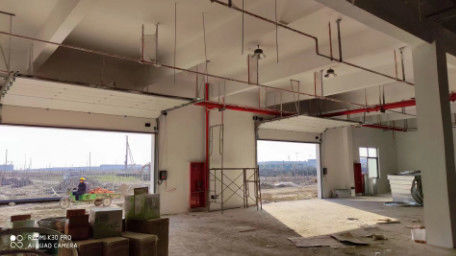 Workshop Sectional Industrial Door Factory Building Industrial Hangar Doors